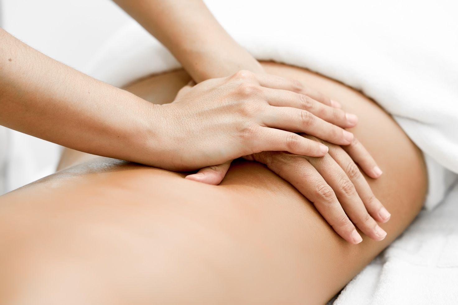 young-woman-receiving-back-massage-spa-center.jpg